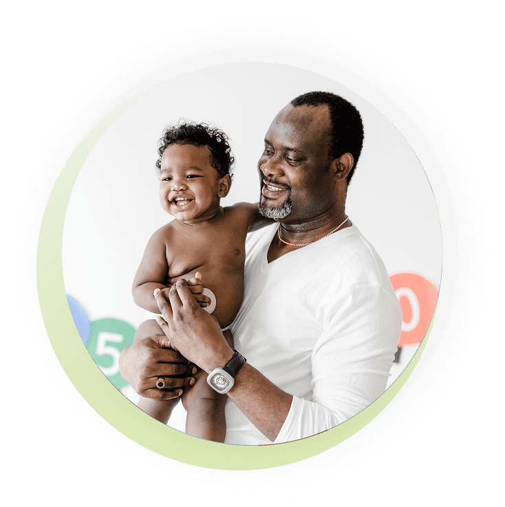 Father carrying a young child
